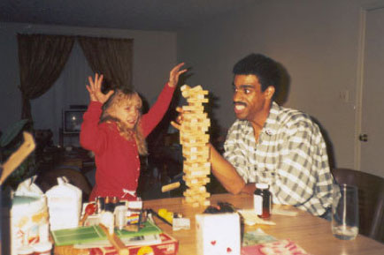 Dad and I playing Jenga... It collapsed seconds later.