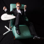 Leo Daedalus as David Bowie, Reclining on The Vivarator Leo Daedalus Channeling David Bowie, Photo by Theresa Pridemore
